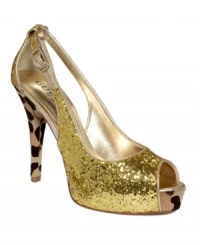 Fierceness is in fashion. With the Hondola3 peep-toe pumps' mix of chunky glitter and leopard print hair, there's no denying their wild side. By GUESS. Fierceness is in fashion. With the Hondola3 peep-toe pumps' mix of chunky glitter and leopard print hair, there's no denying their wild side. By GUESS.