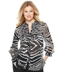 Get a little wild in this Jones New York Signature blouse, featuring an allover animal print on semi-sheer fabric. Try pairing it with a cami and capris for everyday style with bite. Get a little wild in this Jones New York Signature blouse, featuring an allover animal print on semi-sheer fabric. Try pairing it with a cami and capris for everyday style with bite.