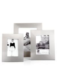 Clean lines and a sleek brushed finish make this aluminum picture frame an always-stylish look for contemporary homes. A versatile choice for landscape or portrait photos. Clean lines and a sleek brushed finish make this aluminum picture frame an always-stylish look for contemporary homes. A versatile choice for landscape or portrait photos.