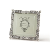 Classic elegance with dozens of large hand-set Swarovski crystals, faux pearls and braided filigree work. Classic elegance with dozens of large hand-set Swarovski crystals, faux pearls and braided filigree work.