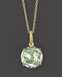 Green quartz sparkle in a 18K yellow gold setting. Green quartz sparkle in a 18K yellow gold setting.