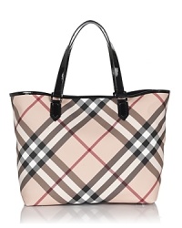 Burberry's roomy and versatile coated canvas tote bag in the brand's iconic check print with leather trims. Burberry's roomy and versatile coated canvas tote bag in the brand's iconic check print with leather trims.
