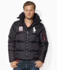 A plush down jacket is constructed with a detachable hood and adorned with Ralph Lauren's Big Pony for unparalleled cold-weather warmth and style. A plush down jacket is constructed with a detachable hood and adorned with Ralph Lauren's Big Pony for unparalleled cold-weather warmth and style.