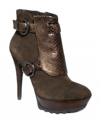 GUESS by Marciano's Risa booties are an experiment in style. A detailed front vamp buckles on at the ankle and underneath the foot for a look that's truly unique. GUESS by Marciano's Risa booties are an experiment in style. A detailed front vamp buckles on at the ankle and underneath the foot for a look that's truly unique.