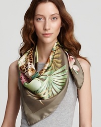 Get set for an uptown safari with this oversized jungle print Salvatore Ferragamo silk scarf, in a bold leopard and palm motif on a khaki background. Get set for an uptown safari with this oversized jungle print Salvatore Ferragamo silk scarf, in a bold leopard and palm motif on a khaki background.