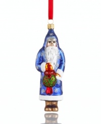 You just might catch Mommy kissing Santa Claus. With a kissing ball in-mitten, Father Christmas peers innocently out of his sparkle-studded robe in this glass Vaillancourt ornament. You just might catch Mommy kissing Santa Claus. With a kissing ball in-mitten, Father Christmas peers innocently out of his sparkle-studded robe in this glass Vaillancourt ornament.