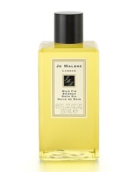 Inspired by breakfast in Tuscany -- the moment of breaking open juicy figs, fresh from the tree -- Wild Fig & Cassis is a delicious fragrance. The scent of sun-warmed figs and delicate cassis is entwined with notes of hyacinth and cedarwood, enveloping the wearer in the warmth of the Mediterranean. Wild Fig & Cassis Bath Oil gently fragrances and moisturizes the skin. Lush and softly foaming, it's pure relaxation. Inspired by breakfast in Tuscany -- the moment of breaking open juicy figs, fresh from the tree -- Wild Fig & Cassis is a delicious fragrance. The scent of sun-warmed figs and delicate cassis is entwined with notes of hyacinth and cedarwood, enveloping the wearer in the warmth of the Mediterranean. Wild Fig & Cassis Bath Oil gently fragrances and moisturizes the skin. Lush and softly foaming, it's pure relaxation.