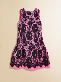 A dramatic silhouette finished with romantic details like a gorgeous back bow and allover lace print.Jewel necklineSleevelessConcealed back zip closureBack bow detailDrop waist skirt56% wool/44% silkDry cleanMade in USA of imported fabric A dramatic silhouette finished with romantic details like a gorgeous back bow and allover lace print.Jewel necklineSleevelessConcealed back zip closureBack bow detailDrop waist skirt56% wool/44% silkDry cleanMade in USA of imported fabric