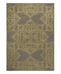 A classic medallion design is brought to life in lush hues of green and grey in this Zanzibar area rug from Sphinx. Its streamlined, low-cut pile and durable construction offer a handsome, lasting finish to any room. (Clearance) A classic medallion design is brought to life in lush hues of green and grey in this Zanzibar area rug from Sphinx. Its streamlined, low-cut pile and durable construction offer a handsome, lasting finish to any room. (Clearance)