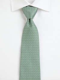 Featuring the signature double-omega print, a classic Salvatore Ferragamo tie made from fine Italian silk.SilkDry cleanMade in Italy Featuring the signature double-omega print, a classic Salvatore Ferragamo tie made from fine Italian silk.SilkDry cleanMade in Italy