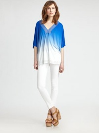 Lace-trimmed v-neck in a vibrant ombré print with three-quarter dolman sleeves and a hi-low hem. V-neck with lace detailsDropped shouldersThree-quarter dolman sleevesHi-low hem with lace trimRayonHand washImportedModel shown is 5'10 (177cm) wearing US size Small. Lace-trimmed v-neck in a vibrant ombré print with three-quarter dolman sleeves and a hi-low hem. V-neck with lace detailsDropped shouldersThree-quarter dolman sleevesHi-low hem with lace trimRayonHand washImportedModel shown is 5'10 (177cm) wearing US size Small.