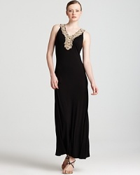 With an embellished neckline and a fluid black silhouette, this Calvin Klein Petites maxi dress will take your look in an elegant direction. Team with sandals and gold accents for goddess-like glamour. With an embellished neckline and a fluid black silhouette, this Calvin Klein Petites maxi dress will take your look in an elegant direction. Team with sandals and gold accents for goddess-like glamour.