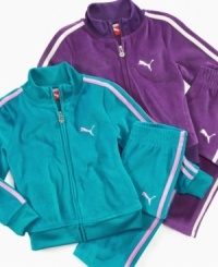 Set her up for some serious playtime in this comfortable and sporty active jacket and pant set from Puma. Set her up for some serious playtime in this comfortable and sporty active jacket and pant set from Puma.