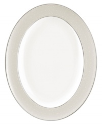 Display your finest meals or simply everyday favorites on this richly elegant serving platter. From innovative designer Monique Lhullier, it features a pearlescent border with glossy raised dots and a fine stitch-like pattern. Display your finest meals or simply everyday favorites on this richly elegant serving platter. From innovative designer Monique Lhullier, it features a pearlescent border with glossy raised dots and a fine stitch-like pattern.