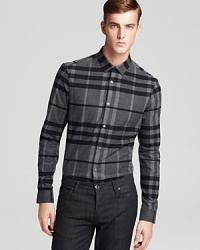 A tonal check and tailored fit bring enviable style to this Burberry London shirt in plush flannel. A tonal check and tailored fit bring enviable style to this Burberry London shirt in plush flannel.