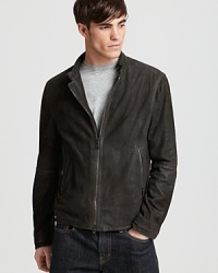 This premier suede jacket has major presence. Refined and cool at the same time, it boasts flashy zipper detail and designer slits at the elbow for a modern, downtown edge. This premier suede jacket has major presence. Refined and cool at the same time, it boasts flashy zipper detail and designer slits at the elbow for a modern, downtown edge.