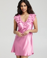 Soft, layered ruffles and a sheer back panel lend fabulously feminine style to this v-neck chemise from Oscar de la Renta Pink Label. Soft, layered ruffles and a sheer back panel lend fabulously feminine style to this v-neck chemise from Oscar de la Renta Pink Label.