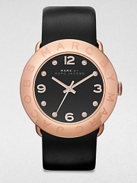 A radiant goldtone ion-platedstainless steel design with a supple leather strap. Quartz movementWater resistant to 5 ATMRound goldtone ion-stainless steel case, 36mm (1.4)Logo engraved bezelBlack dialDot and numeric hour markersSecond hand Black leather strapImported A radiant goldtone ion-platedstainless steel design with a supple leather strap. Quartz movementWater resistant to 5 ATMRound goldtone ion-stainless steel case, 36mm (1.4)Logo engraved bezelBlack dialDot and numeric hour markersSecond hand Black leather strapImported