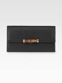 Continental wallet with bamboo detail in leather with light goldtone hardware.Snap closure Twelve card slots Two bill compartments Two separate interior compartments Zip coin pocket Fully lined 7½W X 4¼H X ½D Made in Italy