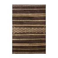 Crafted of hand knotted wool and inspired by the bold stylings of African kuba cloth, this Ralph Lauren rug layers spice-dyed threads for a velvety heathered effect. After weaving, the pile is sheered to a low height for a welcoming heirloom finish. Crafted of hand knotted wool and inspired by the bold stylings of African kuba cloth, this Ralph Lauren rug layers spice-dyed threads for a velvety heathered effect. After weaving, the pile is sheered to a low height for a welcoming heirloom finish.