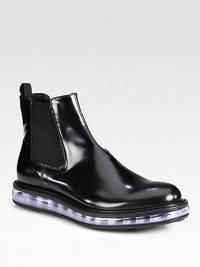Elevated sophistication defines this chelsea boot crafted in polished spazzolato leather with side elastic gores and a transparent cushioned sole for maximum comfort.Leather upperLeather liningRubber soleMade in Italy Elevated sophistication defines this chelsea boot crafted in polished spazzolato leather with side elastic gores and a transparent cushioned sole for maximum comfort.Leather upperLeather liningRubber soleMade in Italy