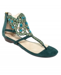 Intricate rhinestone detail at the ankle and along the vamp of Nine West's Unico flat sandals makes this colorful, sparkly pair really stand out. Intricate rhinestone detail at the ankle and along the vamp of Nine West's Unico flat sandals makes this colorful, sparkly pair really stand out.