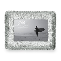 A unique treatment of hand-hammering on top of a cast surface gives this photo frame a unique look. For a beautiful presentation of your most cherished photo. A unique treatment of hand-hammering on top of a cast surface gives this photo frame a unique look. For a beautiful presentation of your most cherished photo.