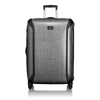 This lightweight, hardside case is ideal for longer trips or two traveling together. Among the many technological and functional advancements of Tegra-Lite™ is Tumi's patented X-Brace 45™ handle system that adds structural rigidity to the case and prevents damage to the handle. The case is lined and features interior accessory pockets and tie-down straps, a removable garment sleeve, TSA integrated locks and exterior bumpers for added protection. A four-wheel system offers incredible maneuverability. This lightweight, hardside case is ideal for longer trips or two traveling together. Among the many technological and functional advancements of Tegra-Lite™ is Tumi's patented X-Brace 45™ handle system that adds structural rigidity to the case and prevents damage to the handle. The case is lined and features interior accessory pockets and tie-down straps, a removable garment sleeve, TSA integrated locks and exterior bumpers for added protection. A four-wheel system offers incredible maneuverability.