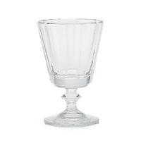 Crafted from gleaming hand-blown crystal, this hand-cut Ralph Lauren wine goblet boasts an elegant art deco-inspired base. Crafted from gleaming hand-blown crystal, this hand-cut Ralph Lauren wine goblet boasts an elegant art deco-inspired base.
