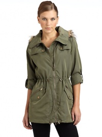 THE LOOKShirt collarHood with removable faux fur trimFront zip closureGun flaps with snap detailEpaulettesLong roll tab snap sleevesDrawstring waistFront zip and flap snap pocketsDrawstring hemBack snap gun flapTHE FITAbout 30 from shoulder to hemTHE MATERIALNylonFully linedCARE & ORIGINMachine washImportedModel shown is 5'9½ (176cm) wearing US size Small.This item was originally available for purchase at Saks THE LOOKShirt collarHood with removable faux fur trimFront zip closureGun flaps with snap detailEpaulettesLong roll tab snap sleevesDrawstring waistFront zip and flap snap pocketsDrawstring hemBack snap gun flapTHE FITAbout 30 from shoulder to hemTHE MATERIALNylonFully linedCARE & ORIGINMachine washImportedModel shown is 5'9½ (176cm) wearing US size Small.This item was originally available for purchase at Saks
