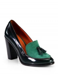 THE LOOKAlmond toeSmooth leather upperColorblock kid suede panel with leather tasselsPadded insoleStacked heel, 3¾ (95mm)THE MATERIALLeather and suede upperLeather lining and soleORIGINImported THE LOOKAlmond toeSmooth leather upperColorblock kid suede panel with leather tasselsPadded insoleStacked heel, 3¾ (95mm)THE MATERIALLeather and suede upperLeather lining and soleORIGINImported