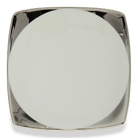 A hand-painted crescent of stunning platinum rims the edges of this thoroughly modern dinnerware collection.