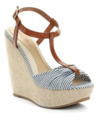 Reach new style milestones in Ciao Bella's Talita linen wedge sandals. A playful smattering of stripes and 5 wedge heels create a chic silhouette. Reach new style milestones in Ciao Bella's Talita linen wedge sandals. A playful smattering of stripes and 5 wedge heels create a chic silhouette.