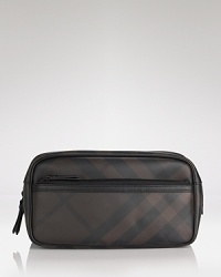 A smart and timeless travel accessory, the Burberry Coalburn Washbag offers a luxe dopp kit that makes jet-setting in style a task that's never been easier. A smart and timeless travel accessory, the Burberry Coalburn Washbag offers a luxe dopp kit that makes jet-setting in style a task that's never been easier.