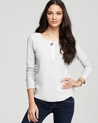 This James Perse top is the comfortable classic henley that stands on its own but lends the perfect layer when needed. This James Perse top is the comfortable classic henley that stands on its own but lends the perfect layer when needed.