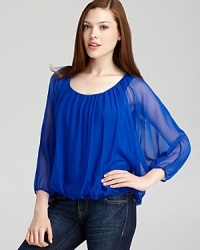 This vividly hued Bailey 44 top is articulated in billowing chiffon that drapes gorgeously on the frame. This vividly hued Bailey 44 top is articulated in billowing chiffon that drapes gorgeously on the frame.
