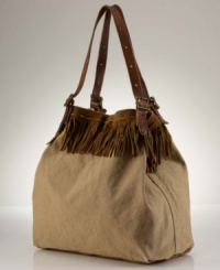 Denim & Supply Ralph Lauren's slouchy, oversized canvas tote gets a couture touch with swingy suede fringe detailing and supple leather accents that owe their inspiration to wilderness roots. Denim & Supply Ralph Lauren's slouchy, oversized canvas tote gets a couture touch with swingy suede fringe detailing and supple leather accents that owe their inspiration to wilderness roots.