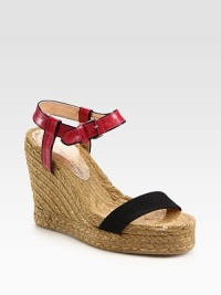 Braided hemp wedge with an adjustable leather ankle strap and contrasting canvas strap. Hemp wedge, 4 (100mm)Hemp platform, 1 (25mm)Compares to a 3 heel (75mm)Leather and canvas upperRubber soleImportedOUR FIT MODEL RECOMMENDS ordering true whole size; ½ sizes should order the next whole size down. 