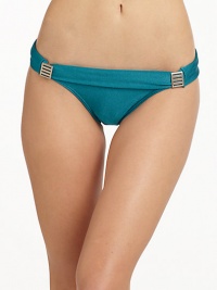 THE LOOKFoldover waist with silvertone ornamentsLogo detail, backTHE MATERIAL85% nylon/15% spandexFully linedCARE & ORIGINHand washImportedPlease note: Bikini top sold separately. THE LOOKFoldover waist with silvertone ornamentsLogo detail, backTHE MATERIAL85% nylon/15% spandexFully linedCARE & ORIGINHand washImportedPlease note: Bikini top sold separately.