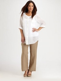 Breezy gauze adds an ethereal feel to this button-down design with a curved, ultra-feminine hem.Round neckThree-quarter sleevesButton frontCurved hemAbout 32 from shoulder to hemLinenMachine washImported Breezy gauze adds an ethereal feel to this button-down design with a curved, ultra-feminine hem.Round neckThree-quarter sleevesButton frontCurved hemAbout 32 from shoulder to hemLinenMachine washImported