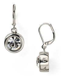 Twinkling crystals and a pristine silver plated setting give these shapely T Tahari leverback danglers wear-with-everything versatility. Twinkling crystals and a pristine silver plated setting give these shapely T Tahari leverback danglers wear-with-everything versatility.