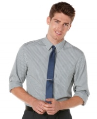 Add a pop of plaid to your work week wardrobe with this handsome slim fit shirt by Perry Ellis. Add a pop of plaid to your work week wardrobe with this handsome slim fit shirt by Perry Ellis.