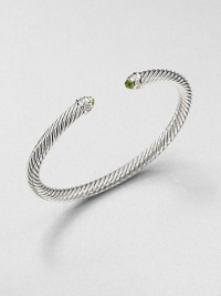 From the Cable Classics Collection. An iconic, sterling silver cable design accented with colorful peridot and sparkling diamonds. PeridotSterling silverDiamonds, .09 tcwDiameter, about 2.25Slip-on styleImported From the Cable Classics Collection. An iconic, sterling silver cable design accented with colorful peridot and sparkling diamonds. PeridotSterling silverDiamonds, .09 tcwDiameter, about 2.25Slip-on styleImported