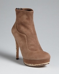Snake things up on platforms with reptile-embossed accents. These House of Harlow 1960 booties sum up '70s boho luxe. Snake things up on platforms with reptile-embossed accents. These House of Harlow 1960 booties sum up '70s boho luxe.