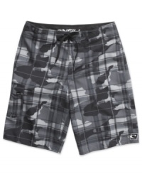 These O'Neill boardshorts mix classic plaid with edgy cameo for a hip surfer style. These O'Neill boardshorts mix classic plaid with edgy cameo for a hip surfer style.