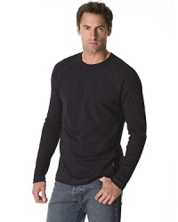 Long sleeved raglan tee with ribbed sleeves and side panels. Crew neck. Long sleeved raglan tee with ribbed sleeves and side panels. Crew neck.