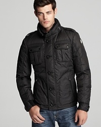 With cool utilitarian appeal, Moncler's Fall Tours shirt jacket keeps warm when temperatures drop. With cool utilitarian appeal, Moncler's Fall Tours shirt jacket keeps warm when temperatures drop.