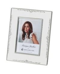 The stylized florals of Modern Love branch out on this gleaming silver-plated picture frame by Monique Lhuillier for Royal Doulton. A timeless balance of refinement and whimsy keeps memories fresh. The stylized florals of Modern Love branch out on this gleaming silver-plated picture frame by Monique Lhuillier for Royal Doulton. A timeless balance of refinement and whimsy keeps memories fresh.