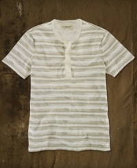 A short-sleeved Henley in soft slub jersey captures the spirit of a lived-in favorite with faded stripes and weathered tribal graphics. A short-sleeved Henley in soft slub jersey captures the spirit of a lived-in favorite with faded stripes and weathered tribal graphics.