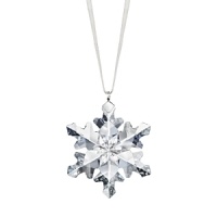 This delicate snowflake formed of sparkling Swarovski crystal lends a wintry touch to the holiday tree or window. For maximum effect, display several together. This delicate snowflake formed of sparkling Swarovski crystal lends a wintry touch to the holiday tree or window. For maximum effect, display several together.